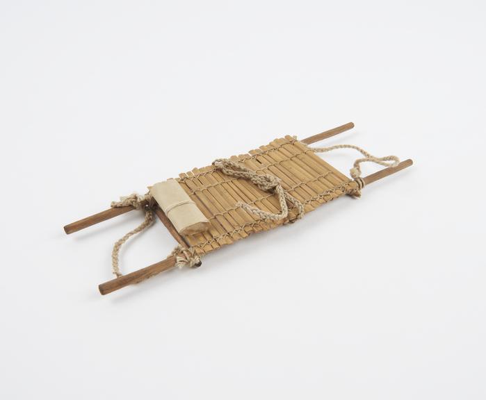 Model stretcher, cane and string, reputedly Japanese, 1900-1918