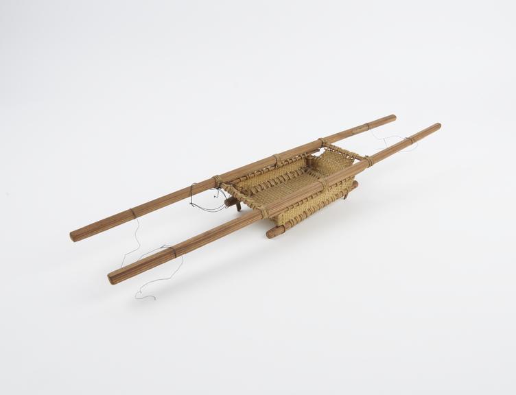 Model stretcher, cane and canvas, reputeldy Japanese, 1900-1918