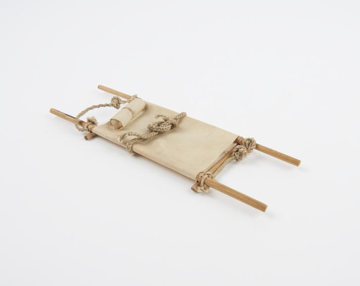 Model of Stretcher made with cane, paper and string