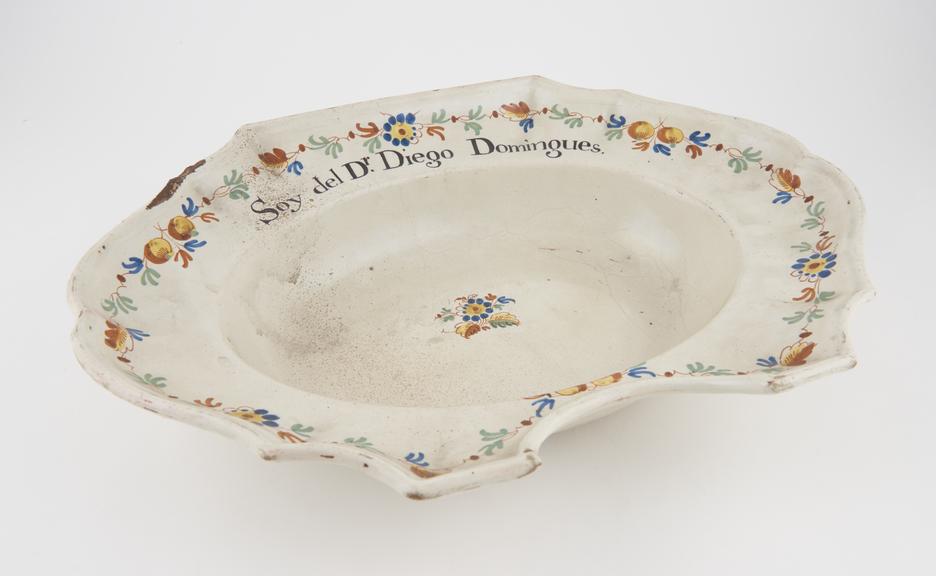 Barber's shaving bowl, in glazed earthenware, Spanish, 1701-1770