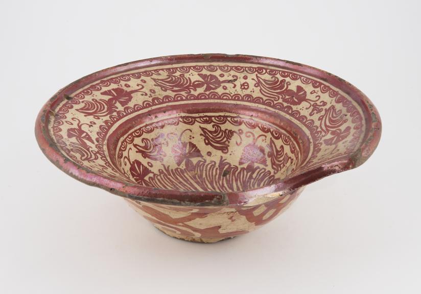 Barber's shaving bowl, lustred earthenware, Hispano-Moresque