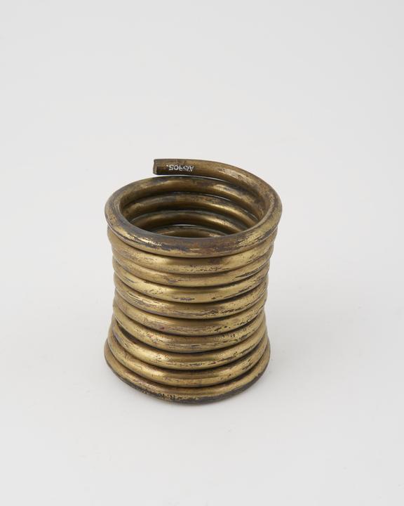 Brass spiral arm ring, worn by Chin women of Padaung