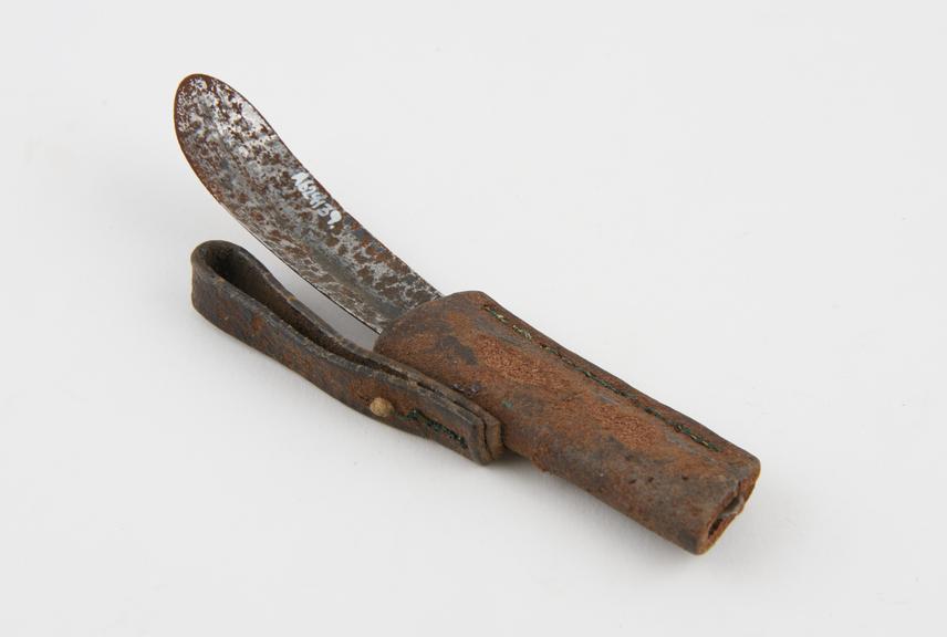 Strigil, steel, with leather sheath, possibly Indian, 1850-1930