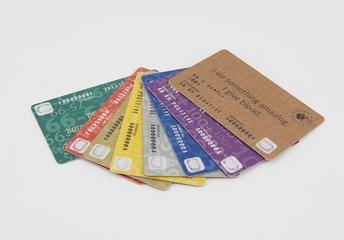 Eight blood donor cards, indicating blood type and donation frequency