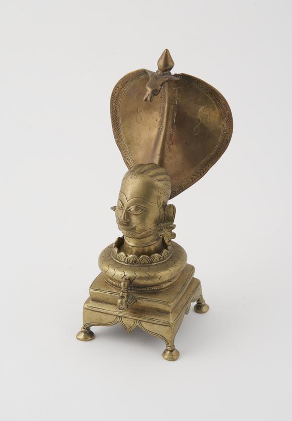 Brass lingam shrine in form of head of Siva, Indian, 1801-1900