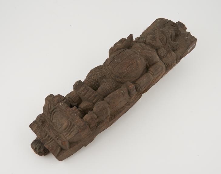 Carved wooden statue pillar of Apaschara