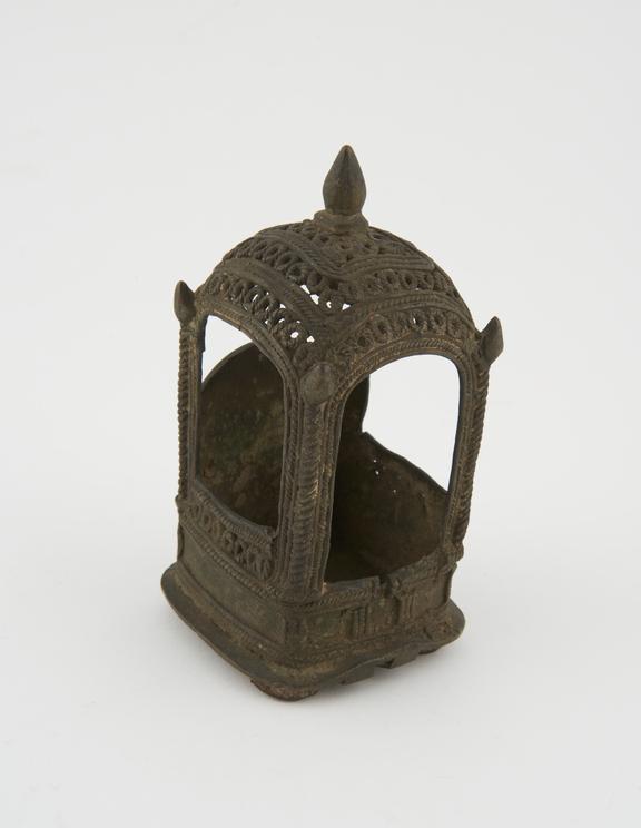 Gilt bronze shrine, small and worn, statue missing, Indian