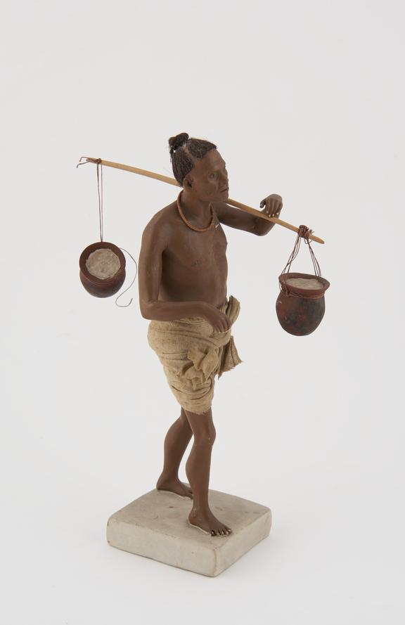 Painted plaster model of Indian in loincloth