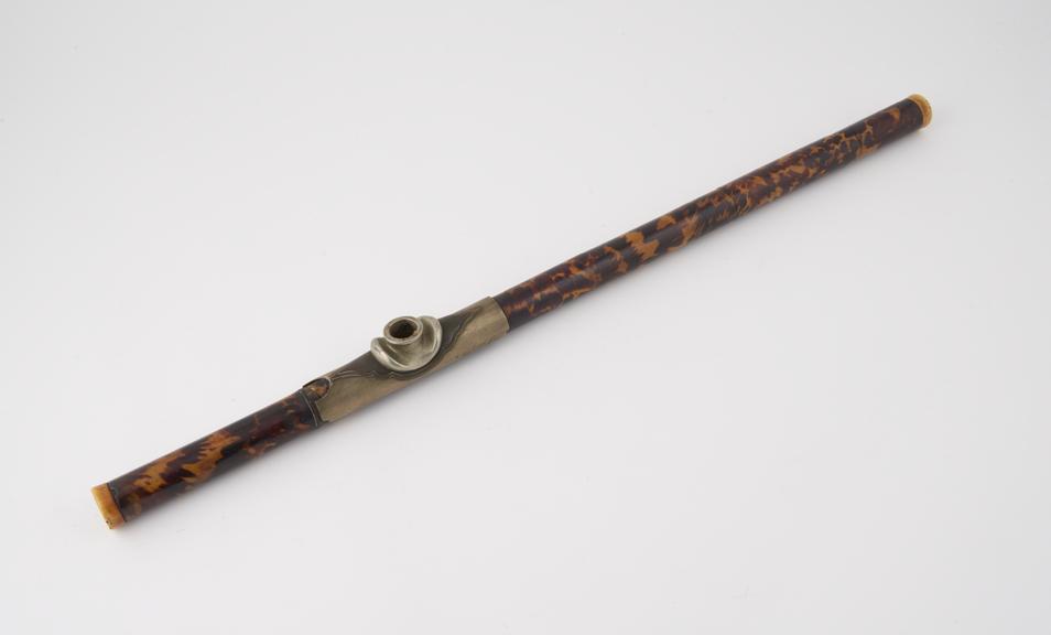 Tortoiseshell opium pipe, with ivory mouthpiece at proximal end