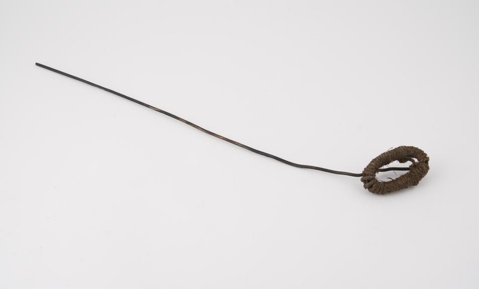 Metal implement, possibly an opium pipe cleaner