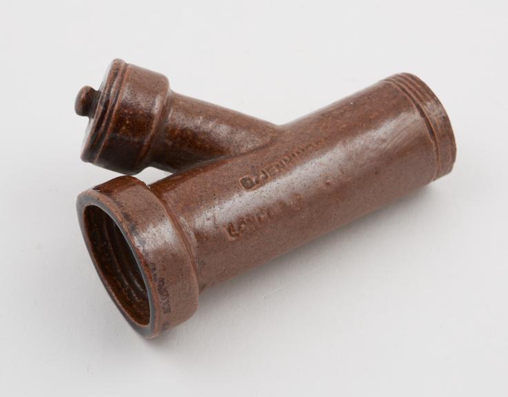 Miniature sample of salt glazed earthenware drainpipe made by