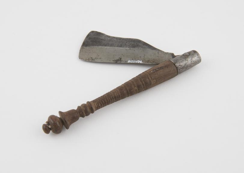 Folding razor, steel, with wooden handle, Tibetan, 1701-1930