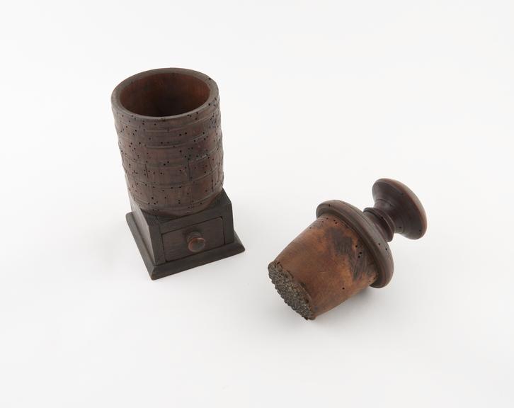 Turned wooden tobacco mill