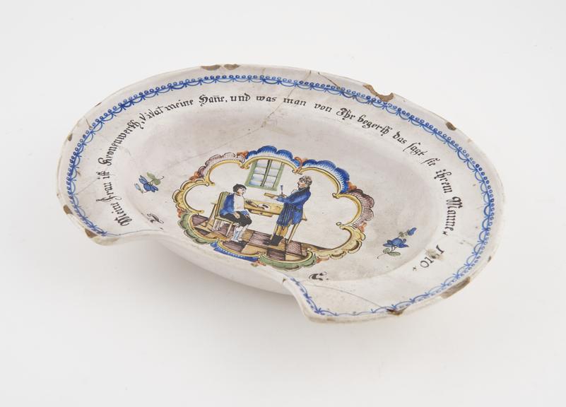 Barber's shaving bowl, tin glazed earthenware, glazed motto