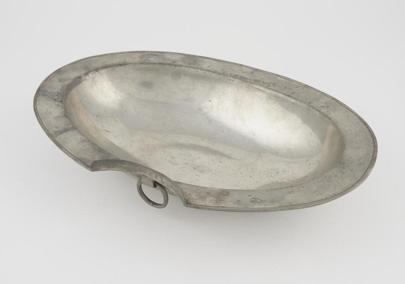 Barber's shaving bowl, pewter, oval-shaped, made in Spain