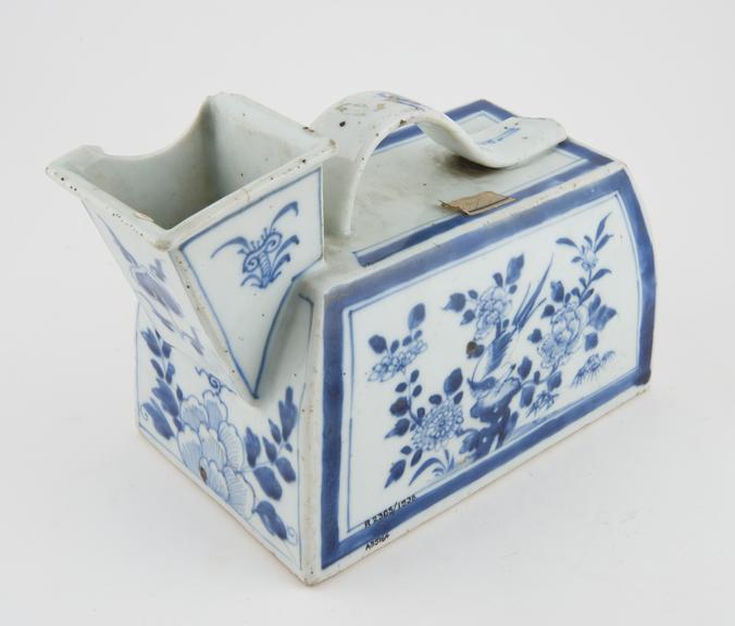 Porcelain box-like male(?) urinal with blue painted decoration