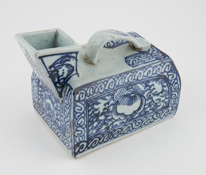 Porcelain box-like male urinal with blue painted decoration