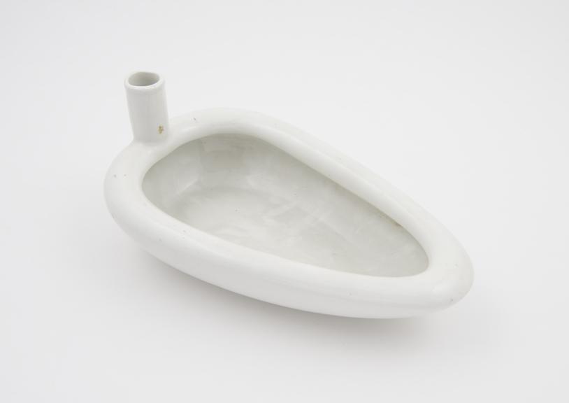 Earthenware, triangular female urinal (spoonbill-shape), by Maw