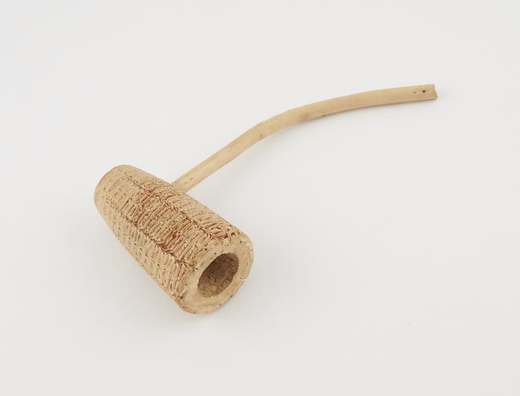 Corn cob tobacco pipe bowl and curved stem, North American