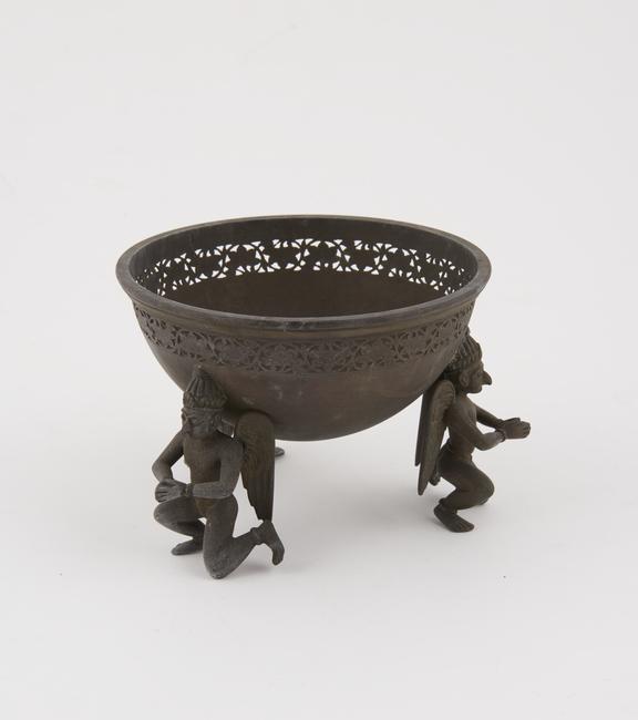 Brass bowl with floral pierced work decoration