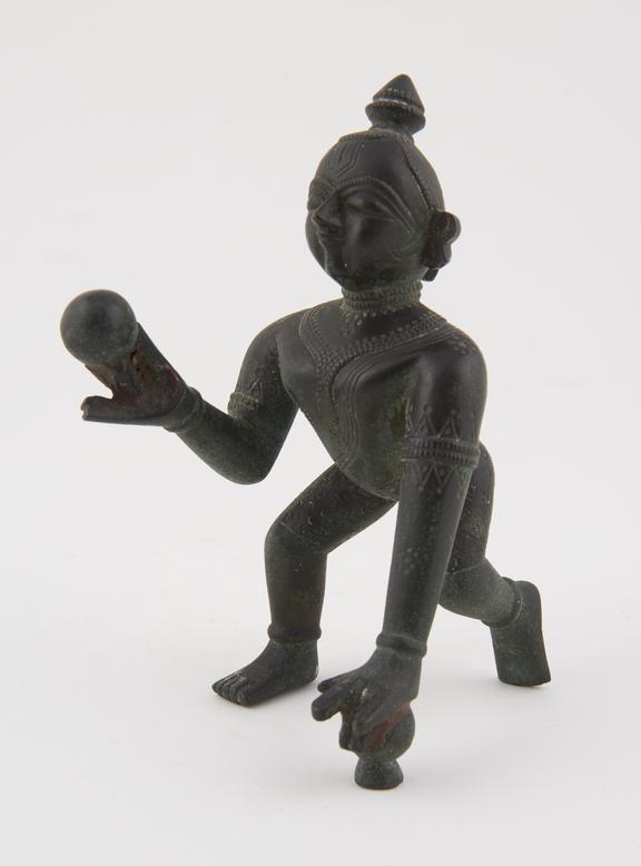 Bronze statue of Krishna as the butter thief, east Indian