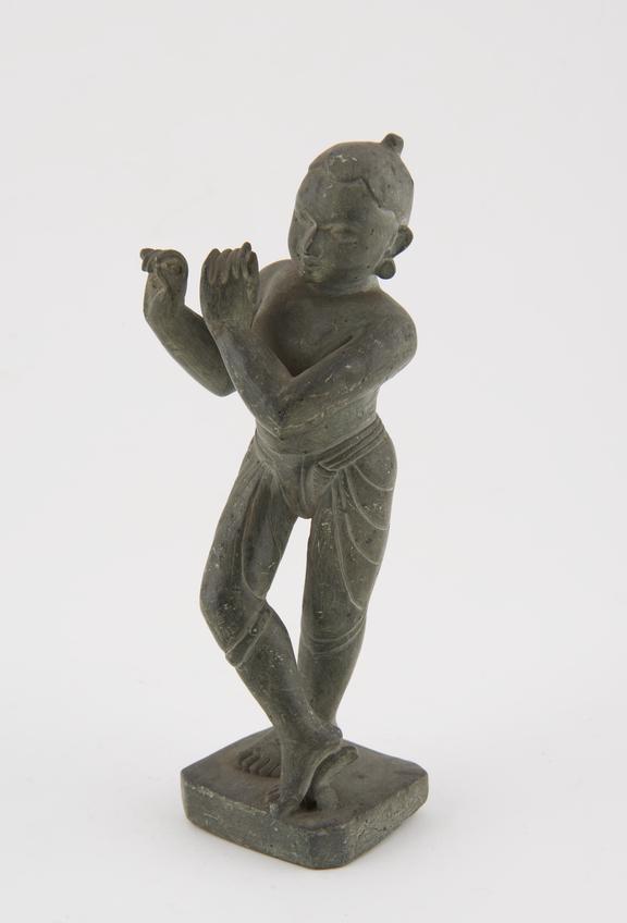 Hindu soapstone figure of Krishna Gopala playing the flute