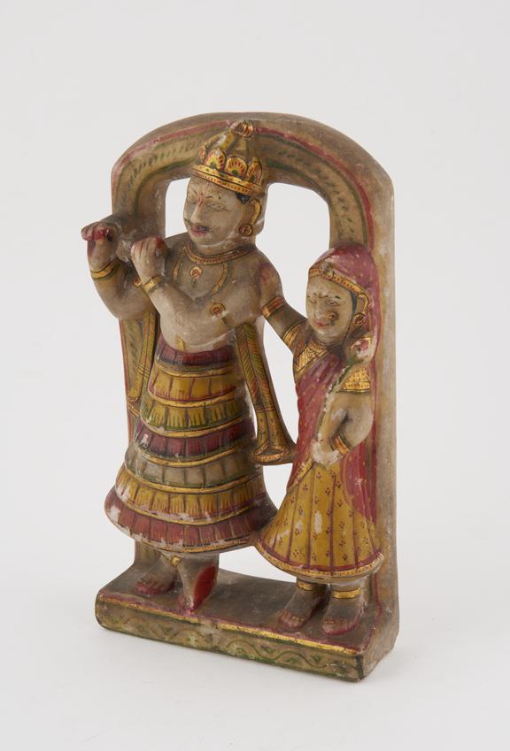 Alabaster shrine of Krishna playing the flute and Rada