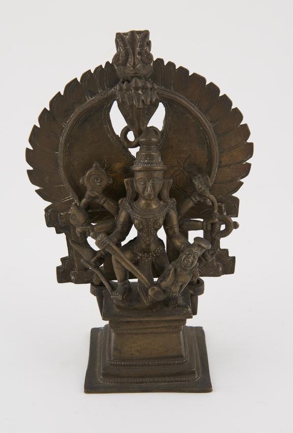 Brass shrine of Durga-Mahisasuramardini with hooded serpent