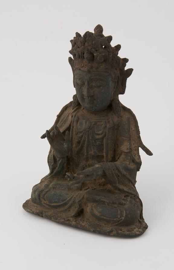 Hollow bronze figure of a seated female (?) deity