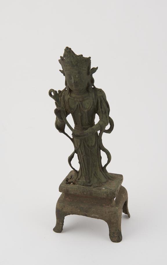 Bronze standing figure on stool-like base, depicts Kuan Yin