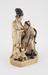 Ivory statuette showing woman breast feeding her old