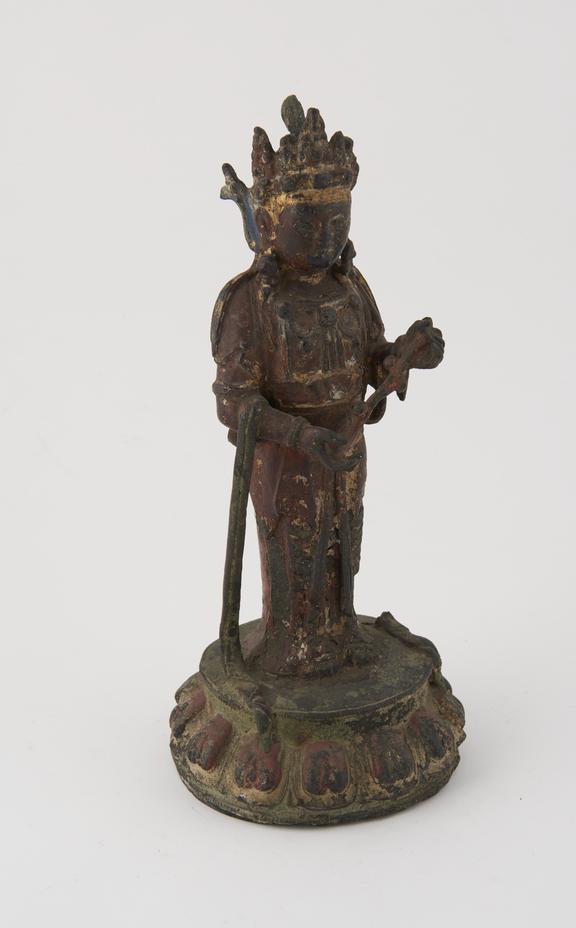 Hollow bronze figure of a standing male deity