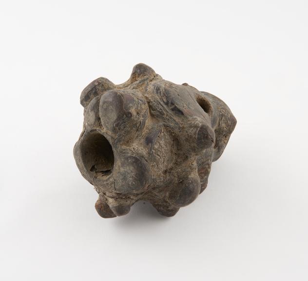 Chunk of gnarled and knotty cherrywood hollowed out to form