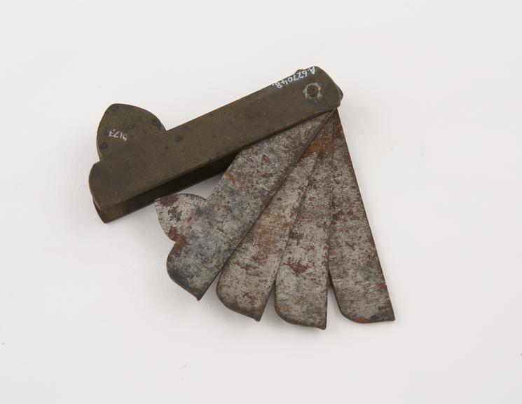 Metal fleam, four bladed, probably veterinary