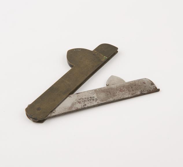 Metal single bladed fleam, probably veterinary, by Chadwell