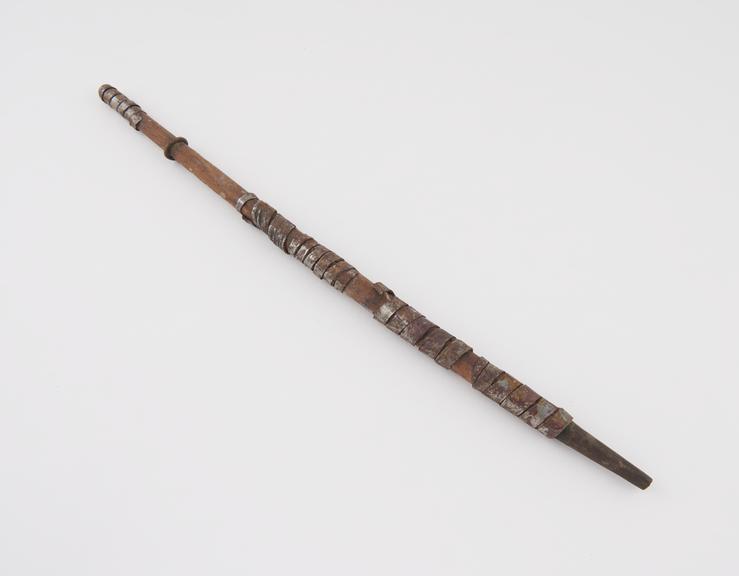 Wooden tobacco pipe stem, tubular, slightly curved