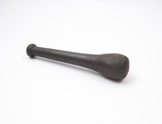 Iron pestle with bulbous grinding end
