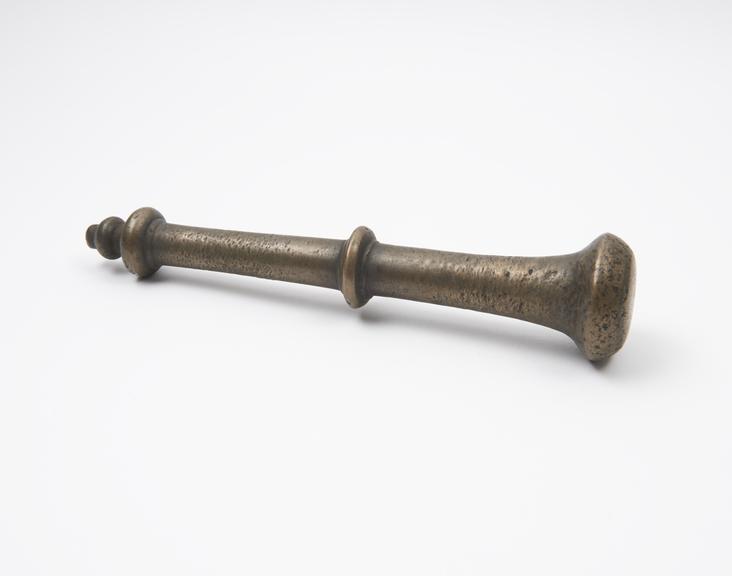 Bronze pestle with trumpet-like grinding end, tapering handle