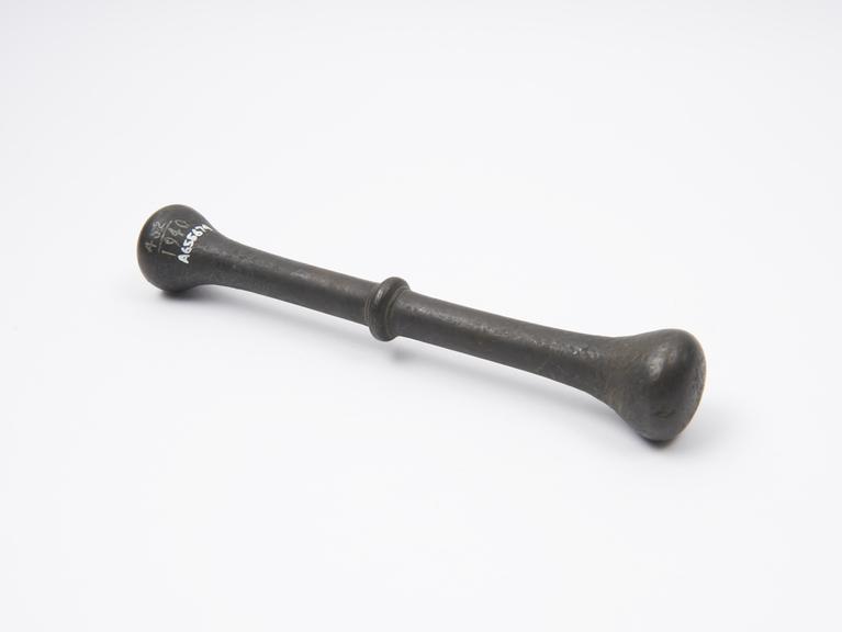 Bronze pestle, double-ended with central flange, European