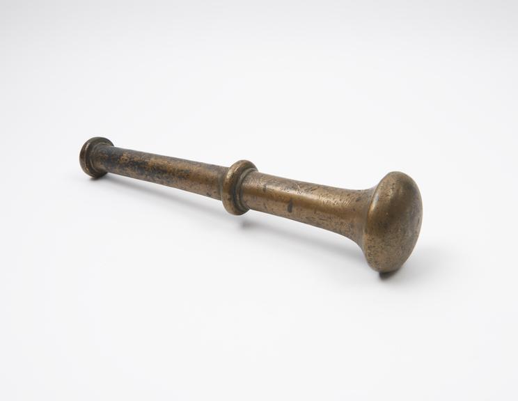 Bronze pestle with flange and button-like finial, European