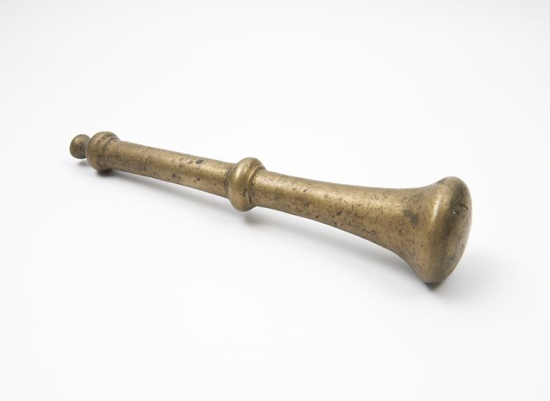 Heavy bronze pestle, trumpet-like finial, European, 1501-1800