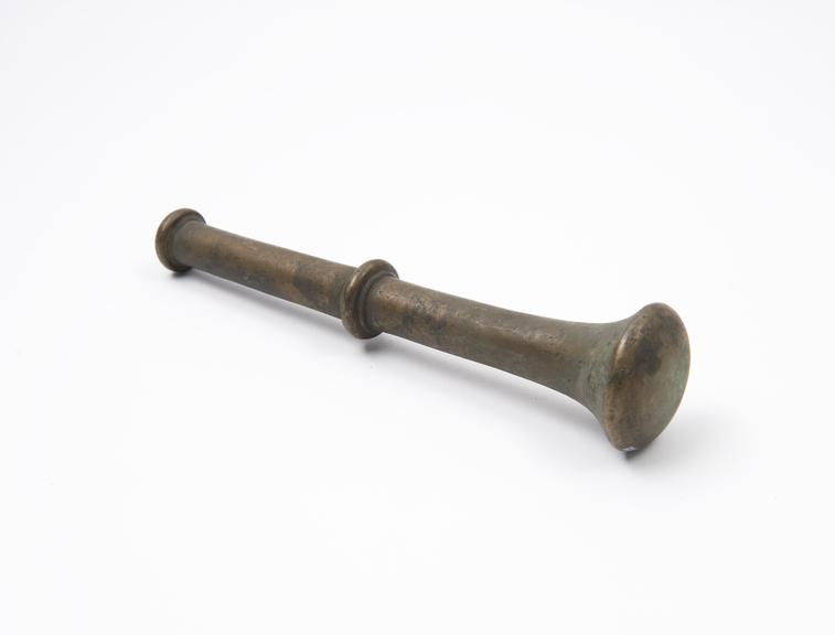 Bronze pestle with trumpet-like grinding end