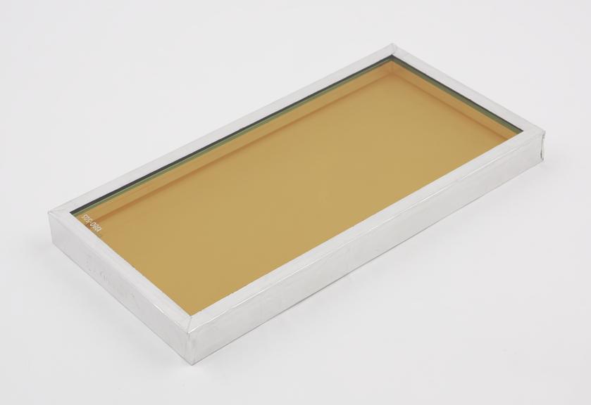 Sample of sun-cool' insulight double glazed panel in gold and