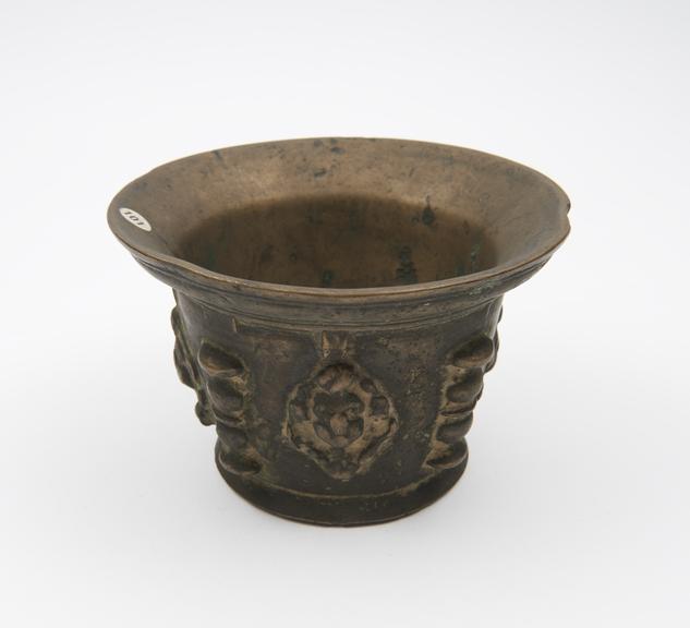 Small squat bronze mortar, high flared rim