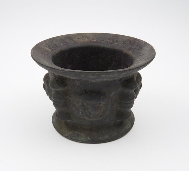 Bronze mortar with thick flat out-turned base, wide flaring rim