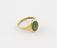 Gold finger ring, with oval engraved green stone