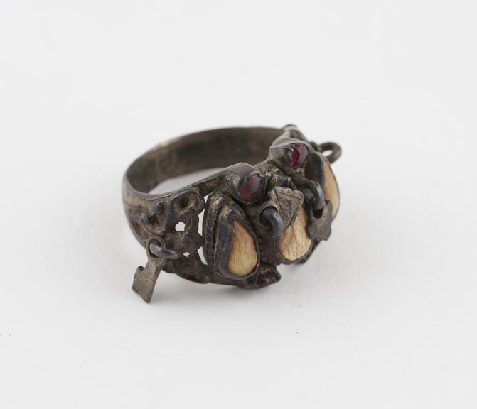 Metal amulet and betrothal ring