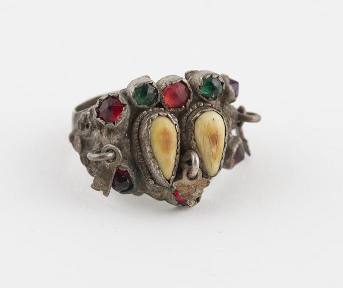 Metal finger ring and amulet, possibly a betrothal ring