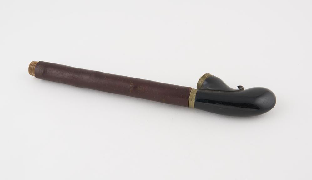 Cherrywood tobacco pipe stem with alloy mounts and a carved