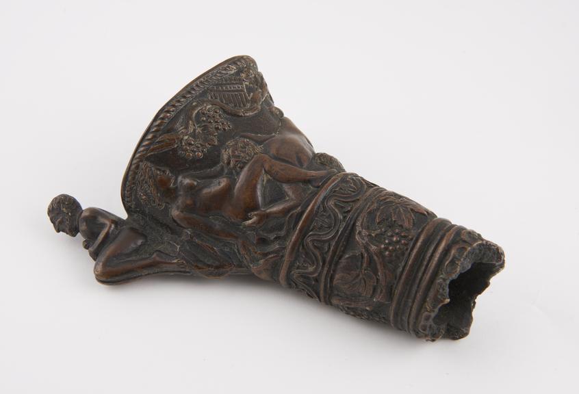 Bronze funnel only, from a bottle depicting an erotic scene